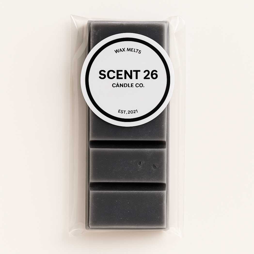 45g Black Pomegranate wax melt snap bar with 5 rich rectangular sections, dark crimson colour with a velvety finish, fragranced with exotic pomegranate, spicy pink pepper, and warm patchouli undertones