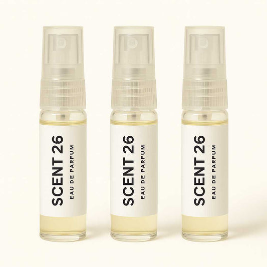 Three 5ml designer inspired perfume samples in glass spray vials from Scent 26, arranged side by side on a neutral background