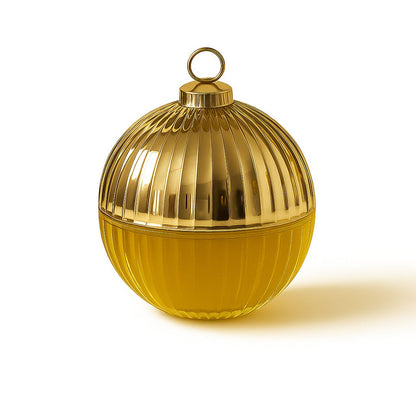 Close up of wooden wick Cosy Christmas bauble candle for holiday atmosphere