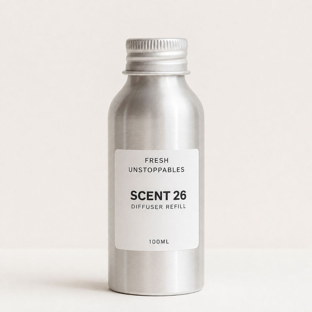 A 100ml silver aluminum diffuser refill bottle with a white label reading 'FRESH UNSTOPPABLES SCENT 26 DIFFUSER REFILL 100ML' on a light beige background.