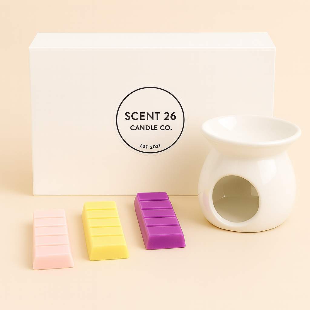 Scented wax melts and a white wax warmer with 'Scent 26 Candle Co.' branding on a beige background.
