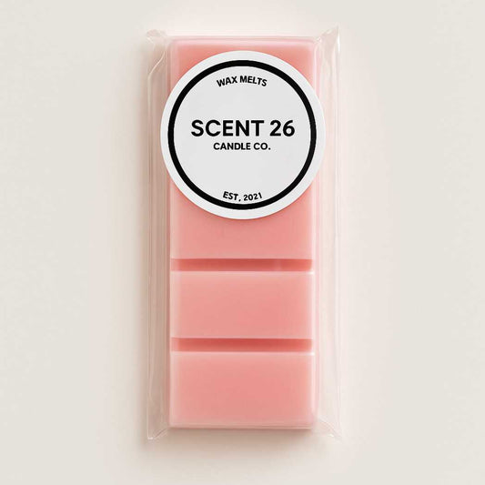 45g Wild Rhubarb + Cinnamon wax melt snap bar with 5 vibrant rectangular sections, deep ruby-red colour with warm cinnamon streaks, fragranced with tart wild rhubarb, spiced cinnamon, and a hint of sweet apple