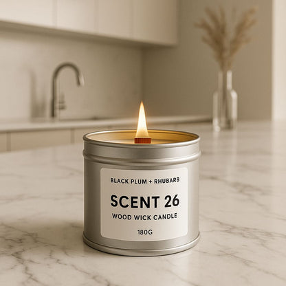 Hand-poured 180g candle with black plum and rhubarb fragrance, in silver tin with wood wick and minimalist label